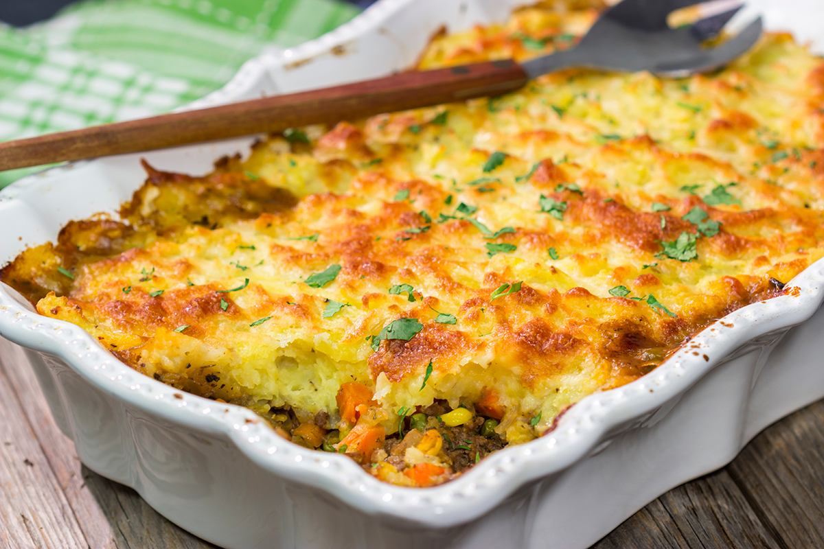 Featuring a ground beef or lamb and vegetable filling topped with cheesy mashed potatoes, this Shepherd's Pie is a classic comfort food meal!