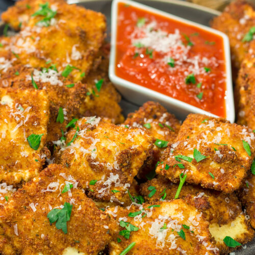 Originating in St. Louis, Toasted Ravioli are fried ravioli served with warm marinara sauce for dipping. These are a fantastic gameday appetizer!