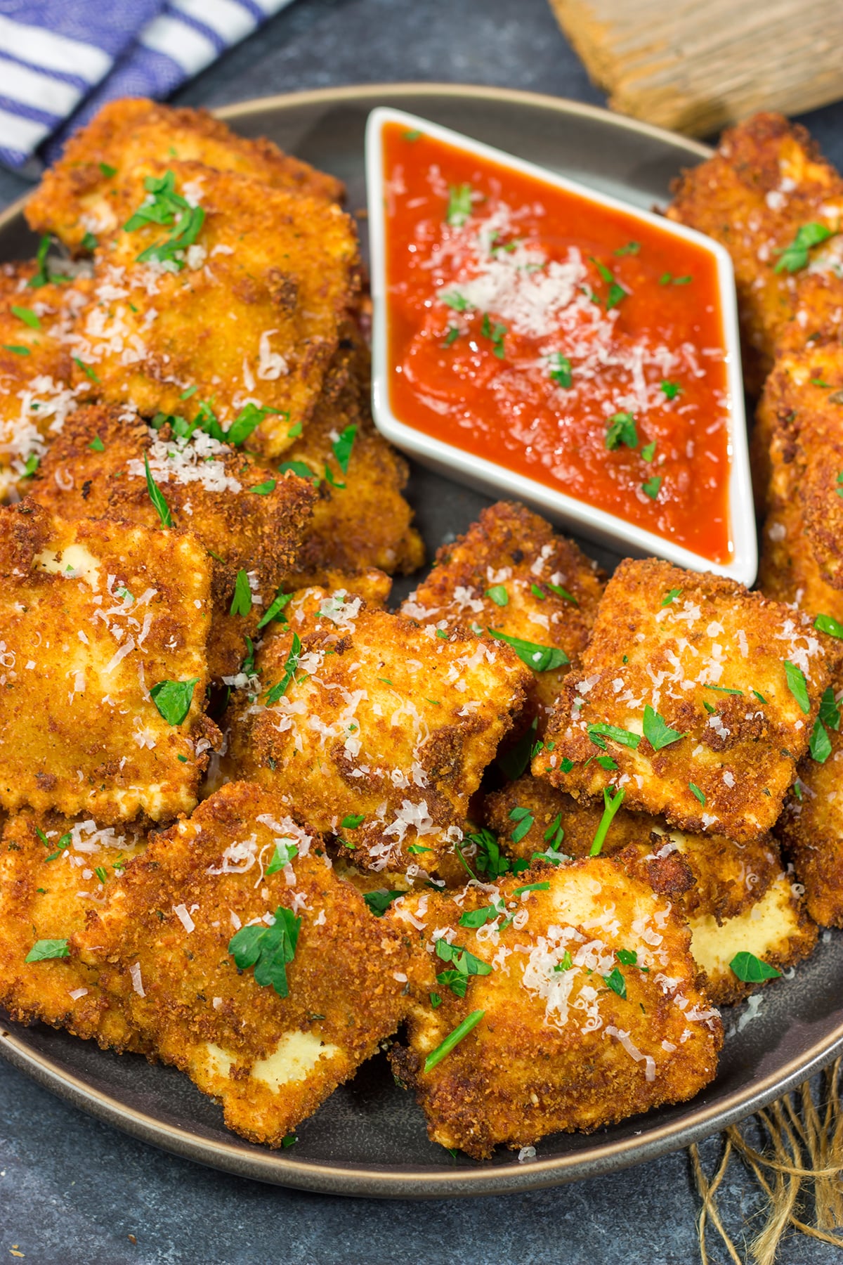 Originating in St. Louis, Toasted Ravioli are fried ravioli served with warm marinara sauce for dipping. These are a fantastic gameday appetizer!