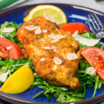 Chicken Milanese features crispy pan-fried chicken cutlets served over a lemony arugula salad. It's surprisingly easy and packed with flavor!