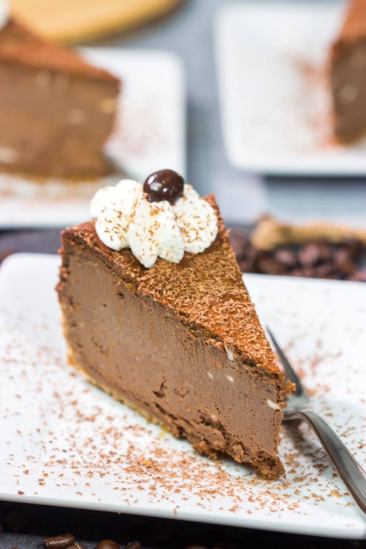 This Chocolate Espresso Cheesecake features the classic combination of chocolate and coffee in a creamy and delicious dessert! Grab a slice for dessert tonight.