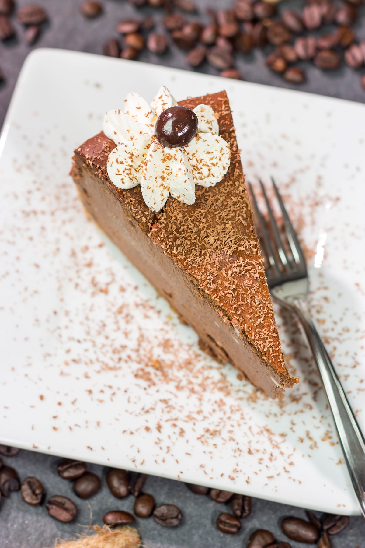 This Chocolate Espresso Cheesecake features the classic combination of chocolate and coffee in a creamy and delicious dessert! Grab a slice for dessert tonight.