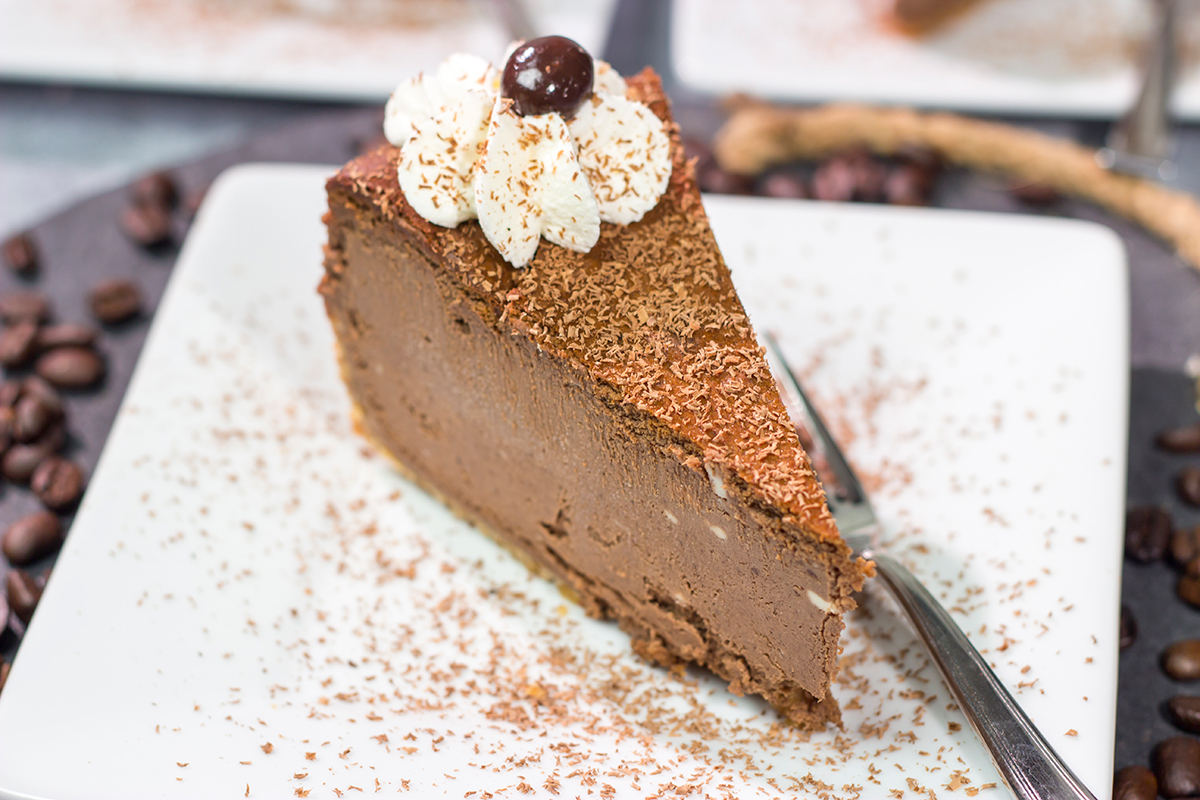 This Chocolate Espresso Cheesecake features the classic combination of chocolate and coffee in a creamy and delicious dessert! Grab a slice for dessert tonight.