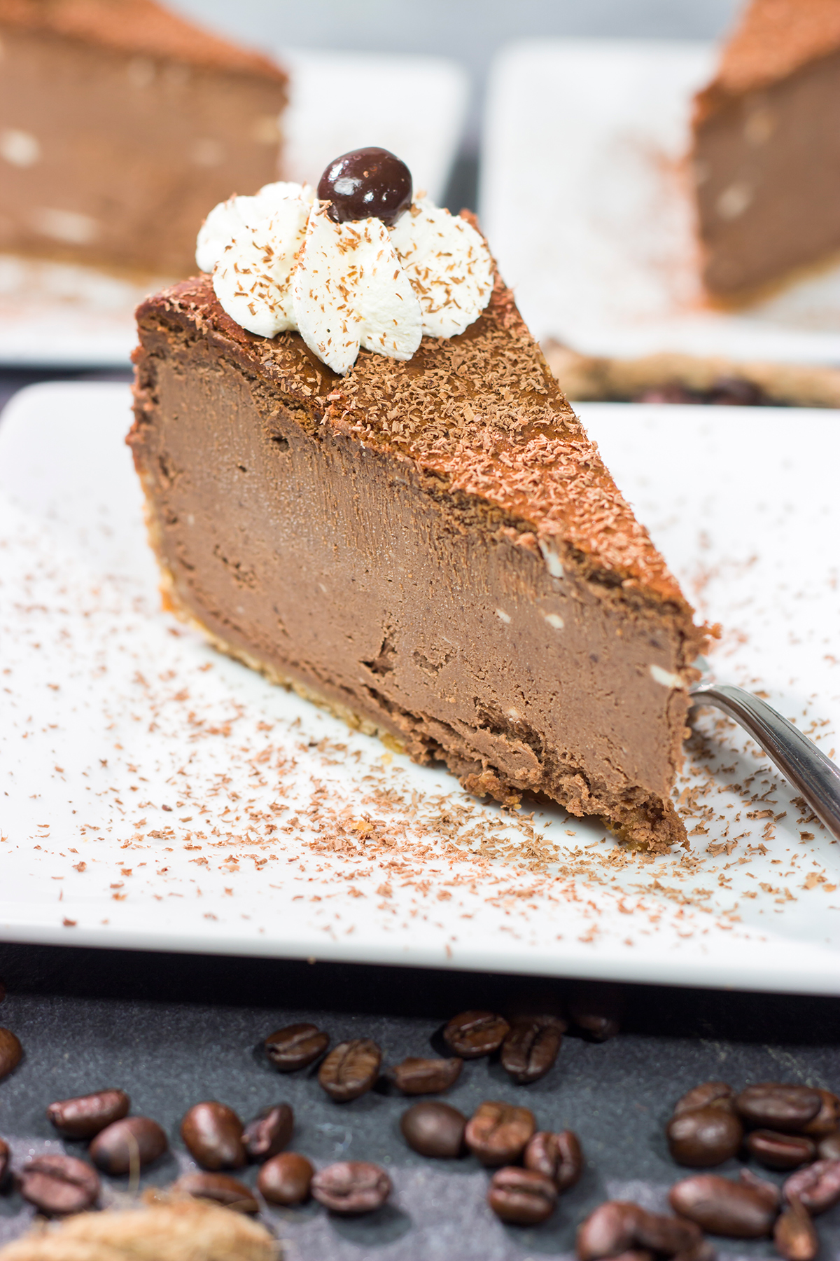 This Chocolate Espresso Cheesecake features the classic combination of chocolate and coffee in a creamy and delicious dessert! Grab a slice for dessert tonight.