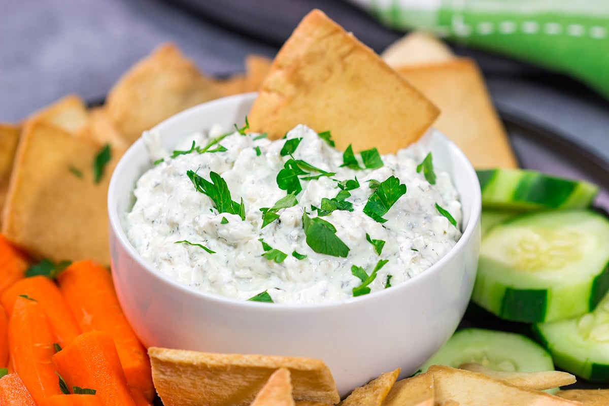 Looking for an easy dip recipe? This Easy Sour Cream Dip recipe is a winner! Serve with a mix of chips and/or veggies for a crowd-pleasing appetizer!