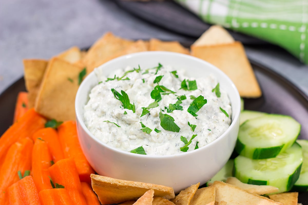 Looking for an easy dip recipe? This Easy Sour Cream Dip recipe is a winner! Serve with a mix of chips and/or veggies for a crowd-pleasing appetizer!