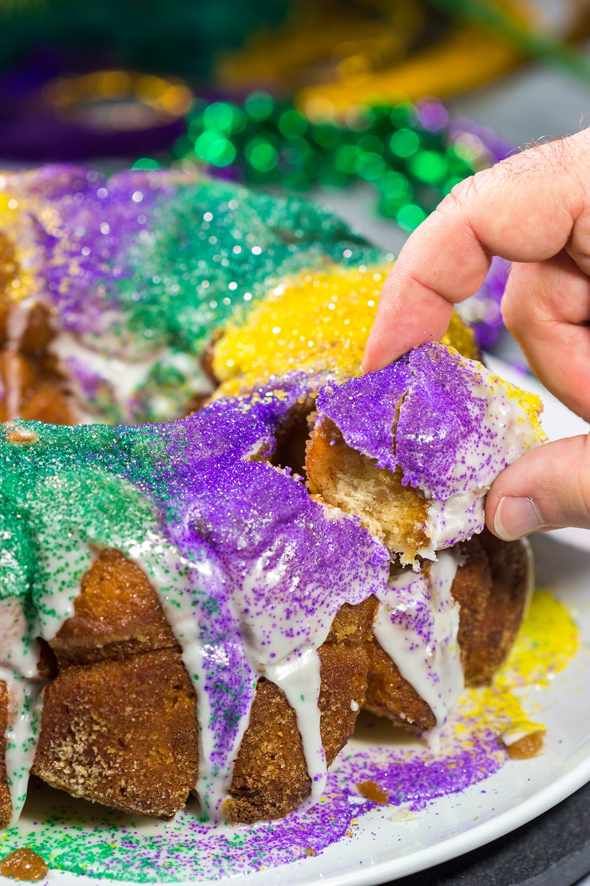 Looking for a delicious way to celebrate Mardi Gras? This Mardi Gras Monkey Bread is an easy and festive treat for the Carnival season!