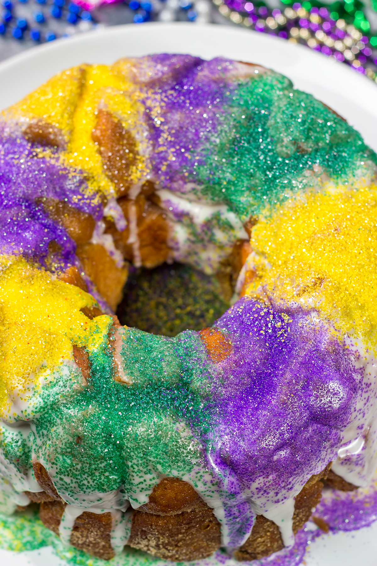 Looking for a delicious way to celebrate Mardi Gras? This Mardi Gras Monkey Bread is an easy and festive treat for the Carnival season!