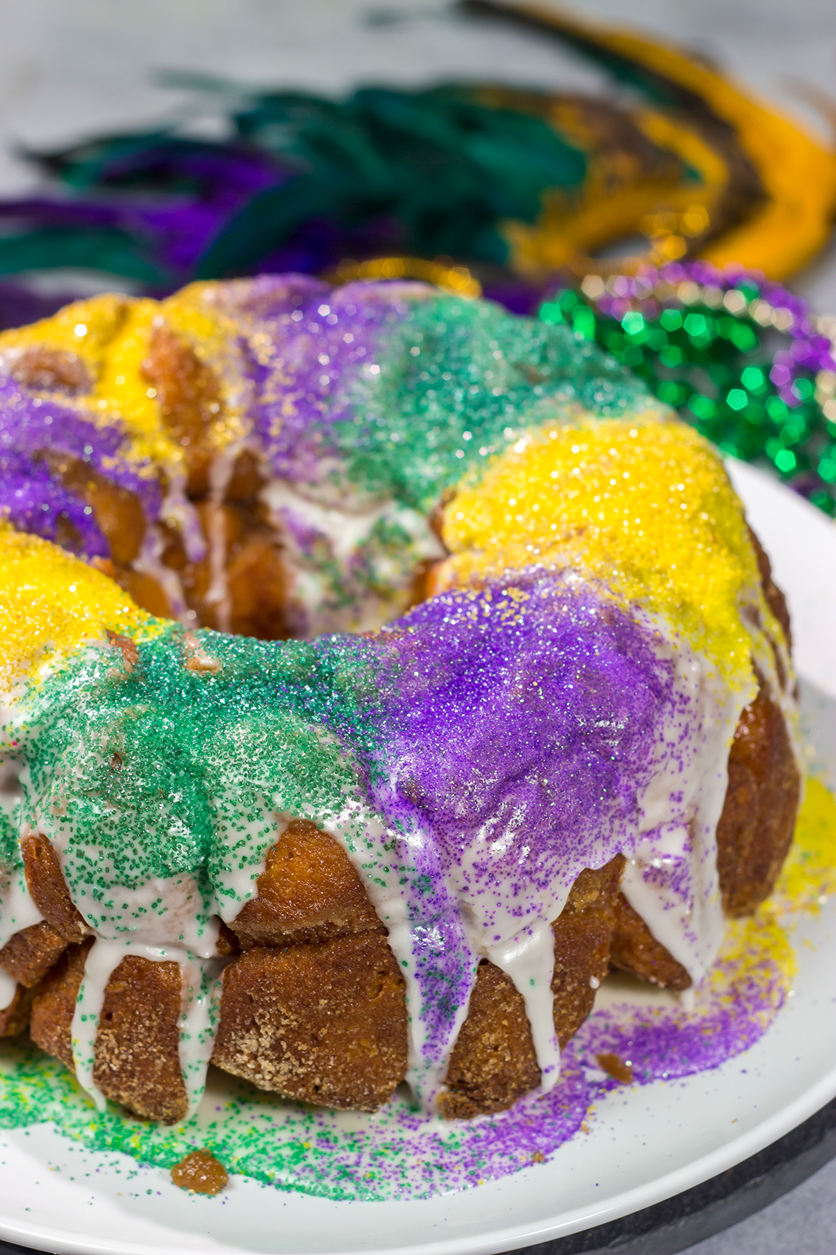 Looking for a delicious way to celebrate Mardi Gras? This Mardi Gras Monkey Bread is an easy and festive treat for the Carnival season!