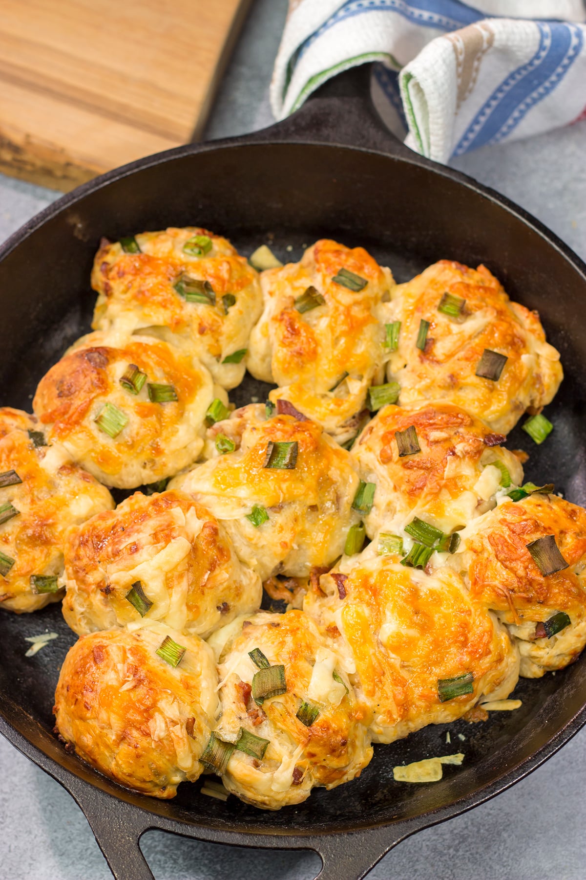 Take your dinner rolls to a whole new level! These Bacon Cheddar Rolls are packed with crispy bacon and sharp cheddar cheese. Yum!