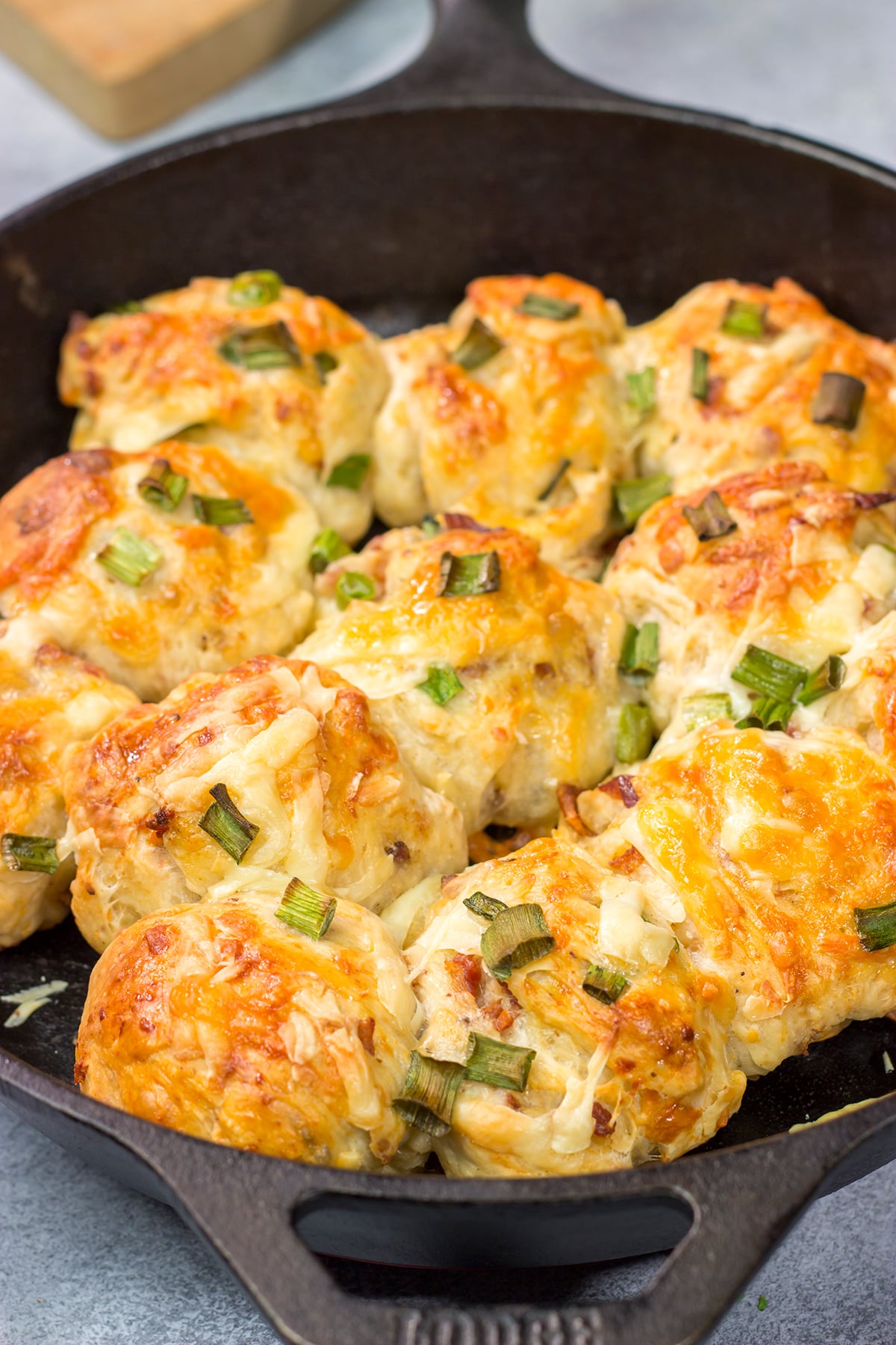 Take your dinner rolls to a whole new level! These Bacon Cheddar Rolls are packed with crispy bacon and sharp cheddar cheese. Yum!