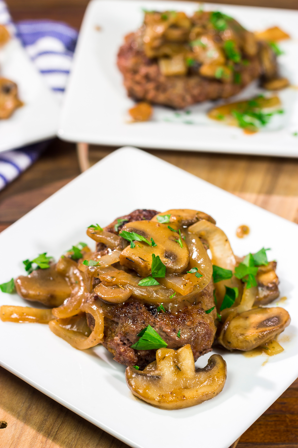 These Hamburger Steaks with Gravy are a classic comfort food...and they're easy enough to make as a weeknight meal!