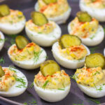 This Southern Deviled Eggs recipe is a classic appetizer for family gatherings and picnics. The eggs are filled with a creamy, delicious filling - perfect finger food!