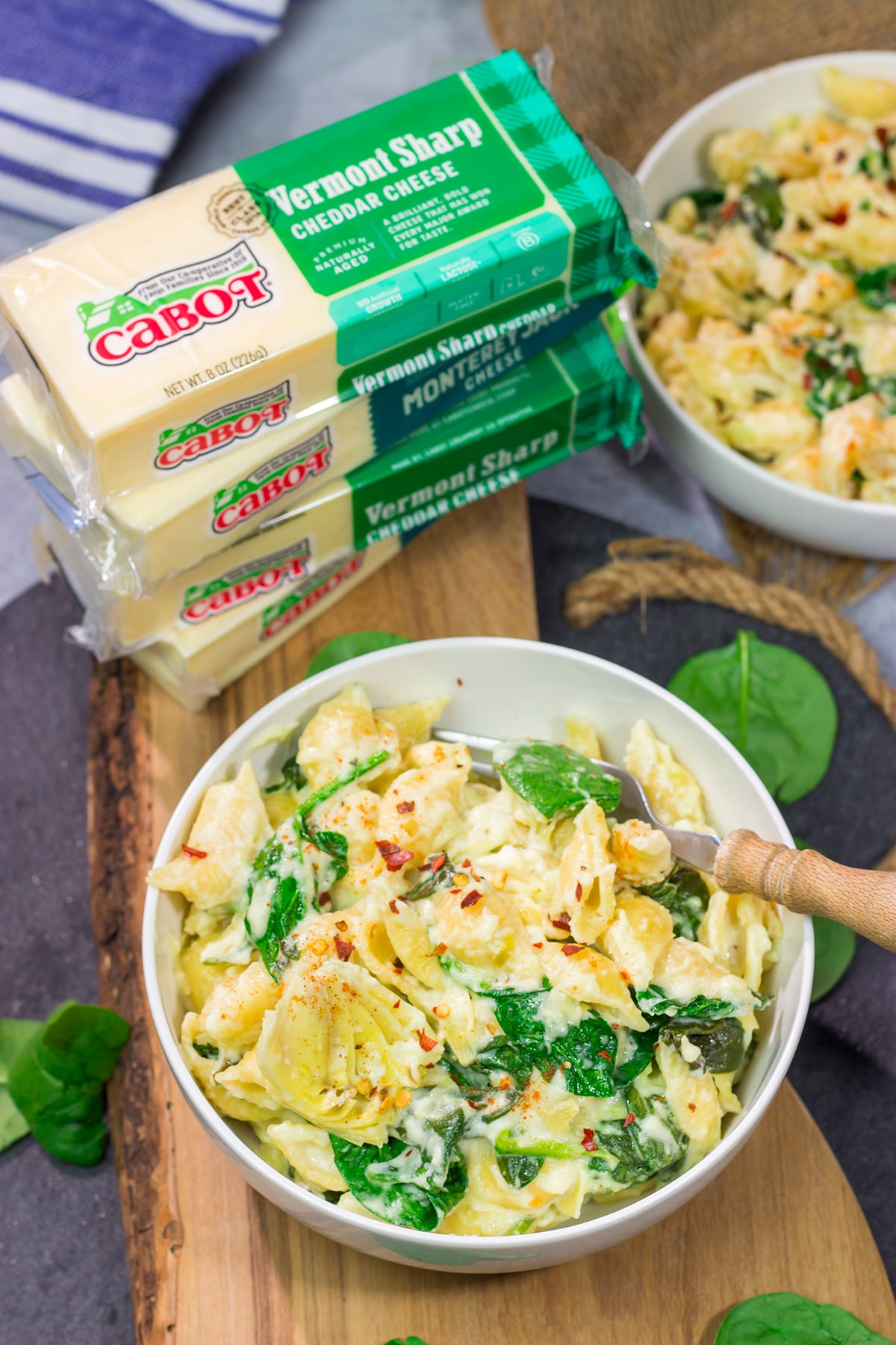 Elevate your mac and cheese game with this Spinach Artichoke Mac and Cheese. This bold and creamy recipe is the ultimate definition of comfort food!