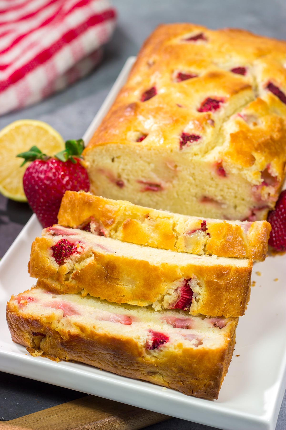 This Strawberry Lemonade Quick Bread is a delicious combination of sweet and tart - it's a great way to bake with juicy summer strawberries!