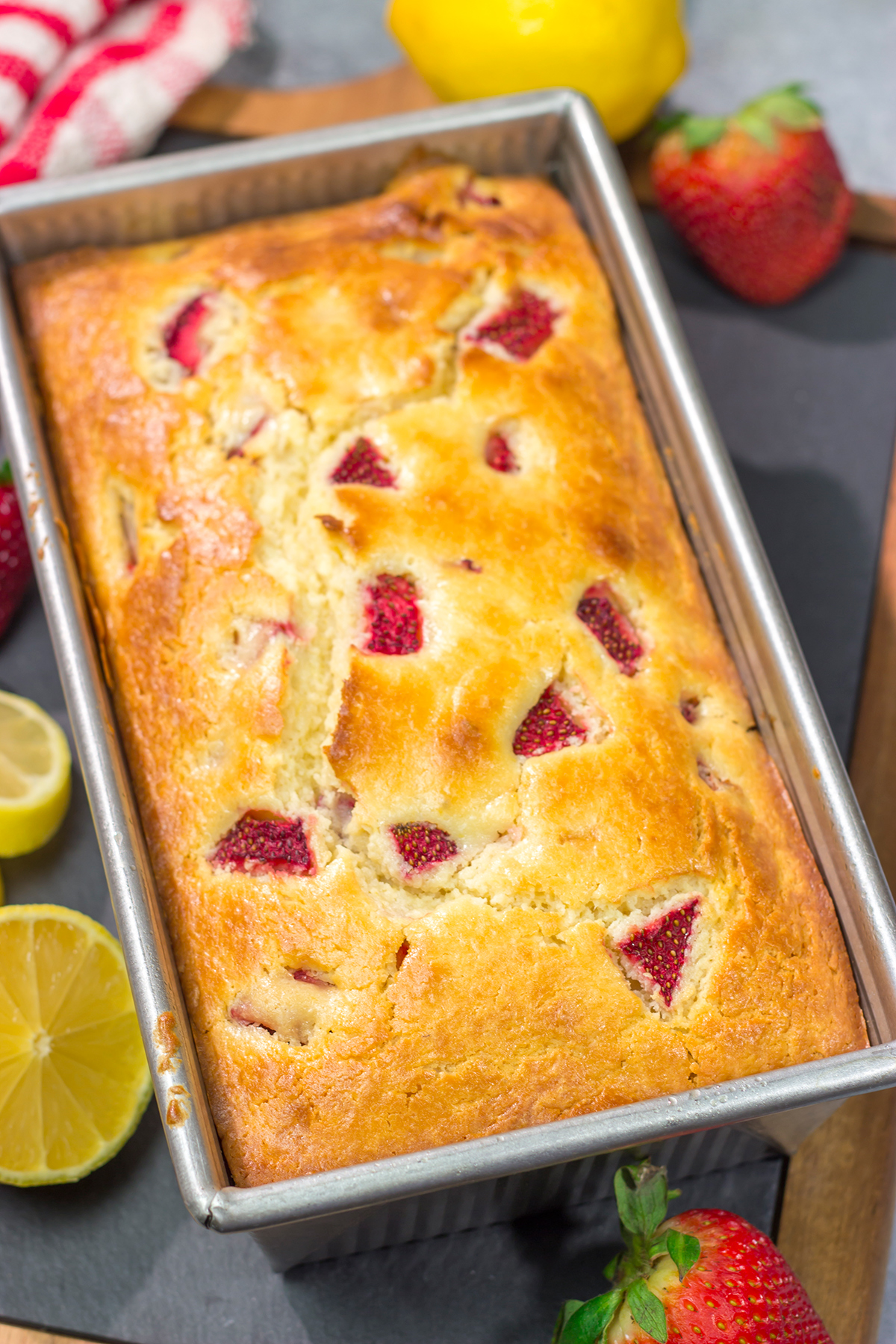 This Strawberry Lemonade Quick Bread is a delicious combination of sweet and tart - it's a great way to bake with juicy summer strawberries!