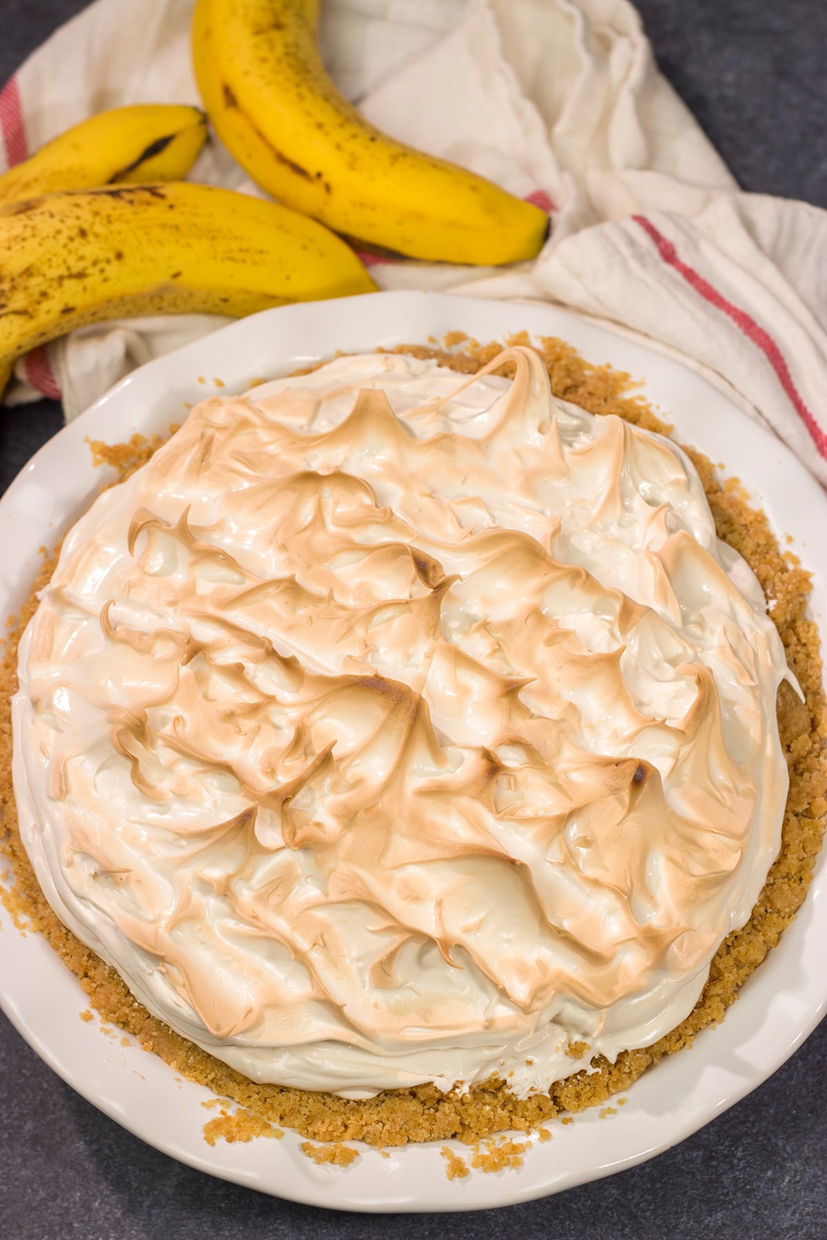This Banana Pudding Pie features a creamy banana pudding base topped with a light and airy meringue. It's a combination of two favorites in one!
