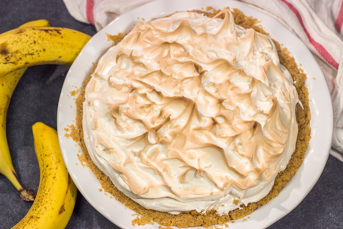 This Banana Pudding Pie features a creamy banana pudding base topped with a light and airy meringue. It's a combination of two favorites in one!