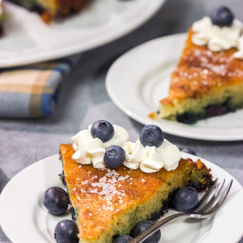 This Blueberry Buttermilk Cake is sweet, tangy...and super easy to make! It's a great recipe for warm summer mornings.