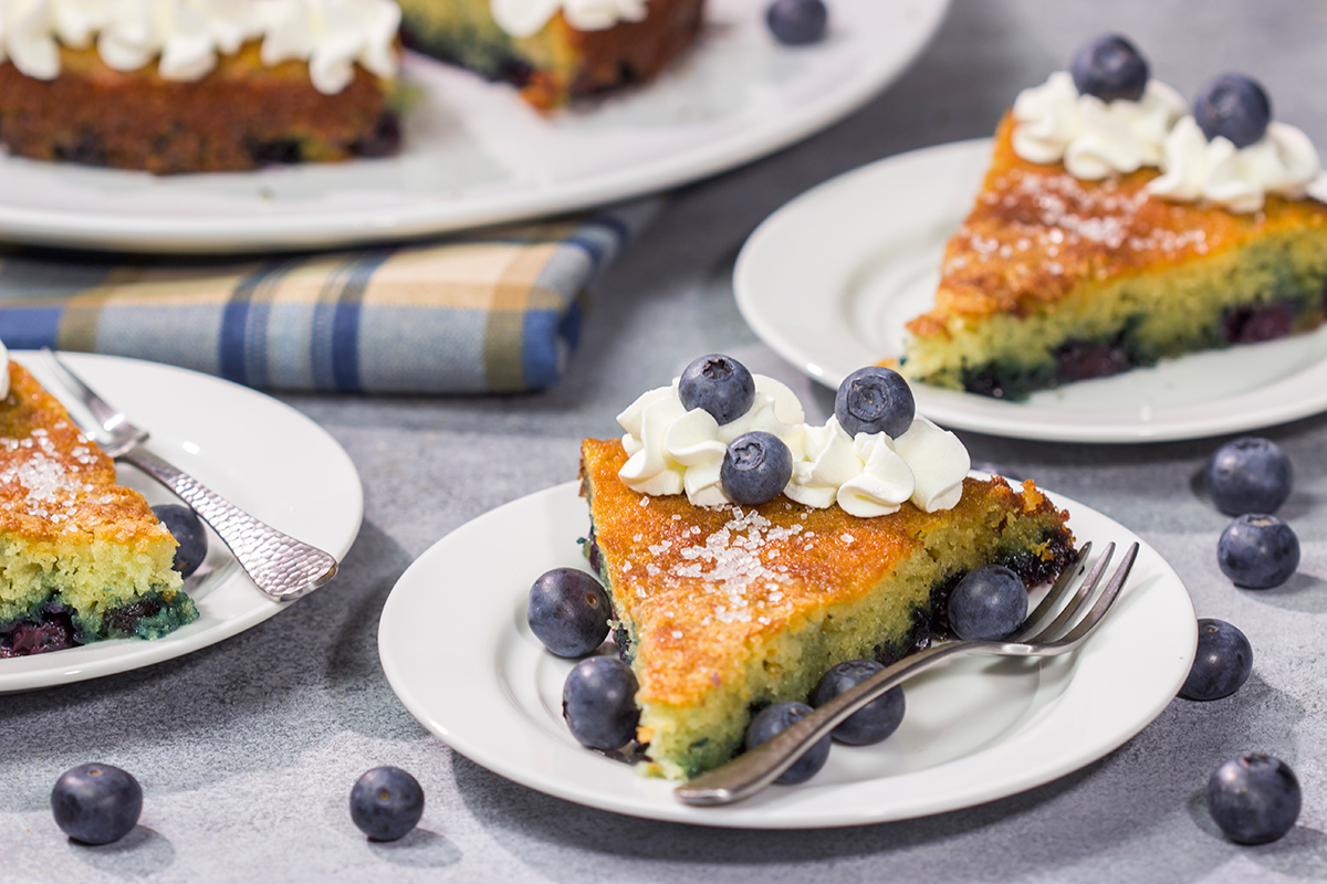 This Blueberry Buttermilk Cake is sweet, tangy...and super easy to make! It's a great recipe for warm summer mornings.