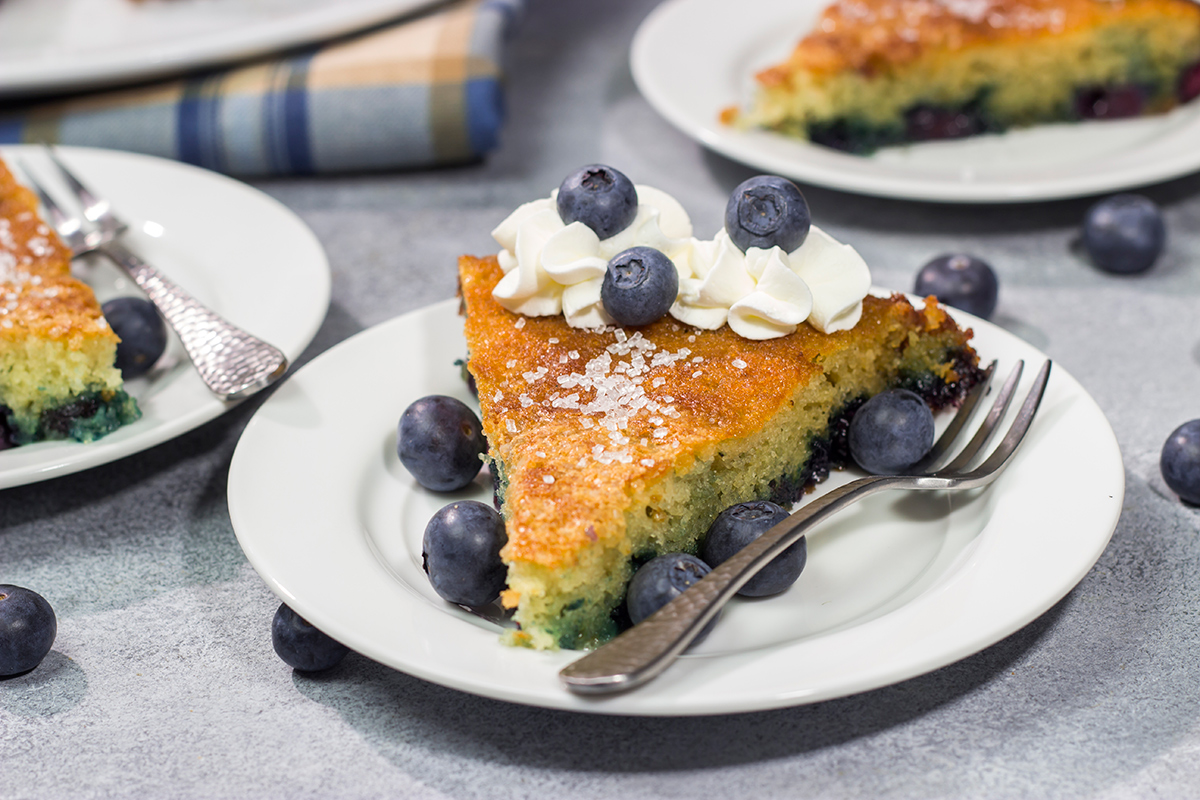 This Blueberry Buttermilk Cake is sweet, tangy...and super easy to make! It's a great recipe for warm summer mornings.