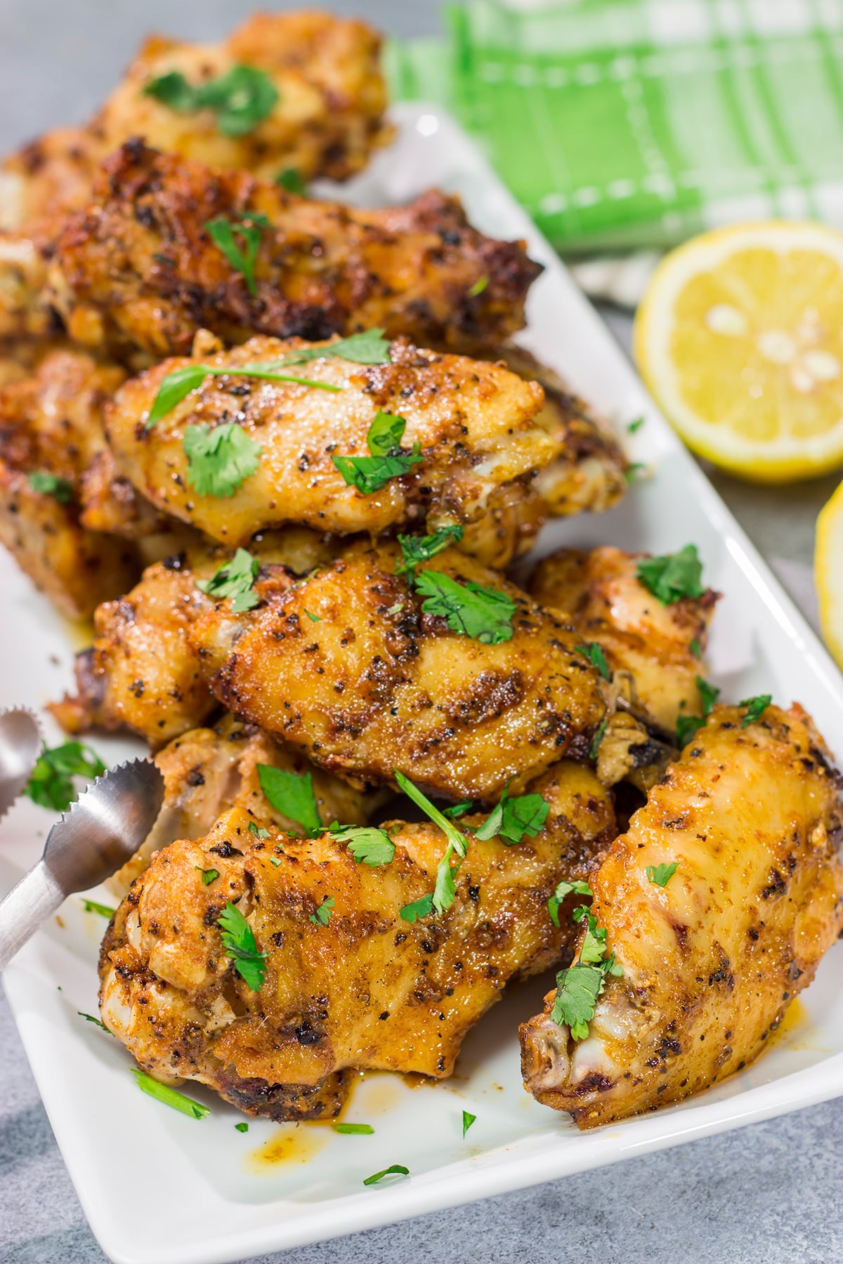 These Lemon Pepper Wings are perfect for summer barbecues in the backyard! Go ahead and make a double batch - you'll be glad you did!