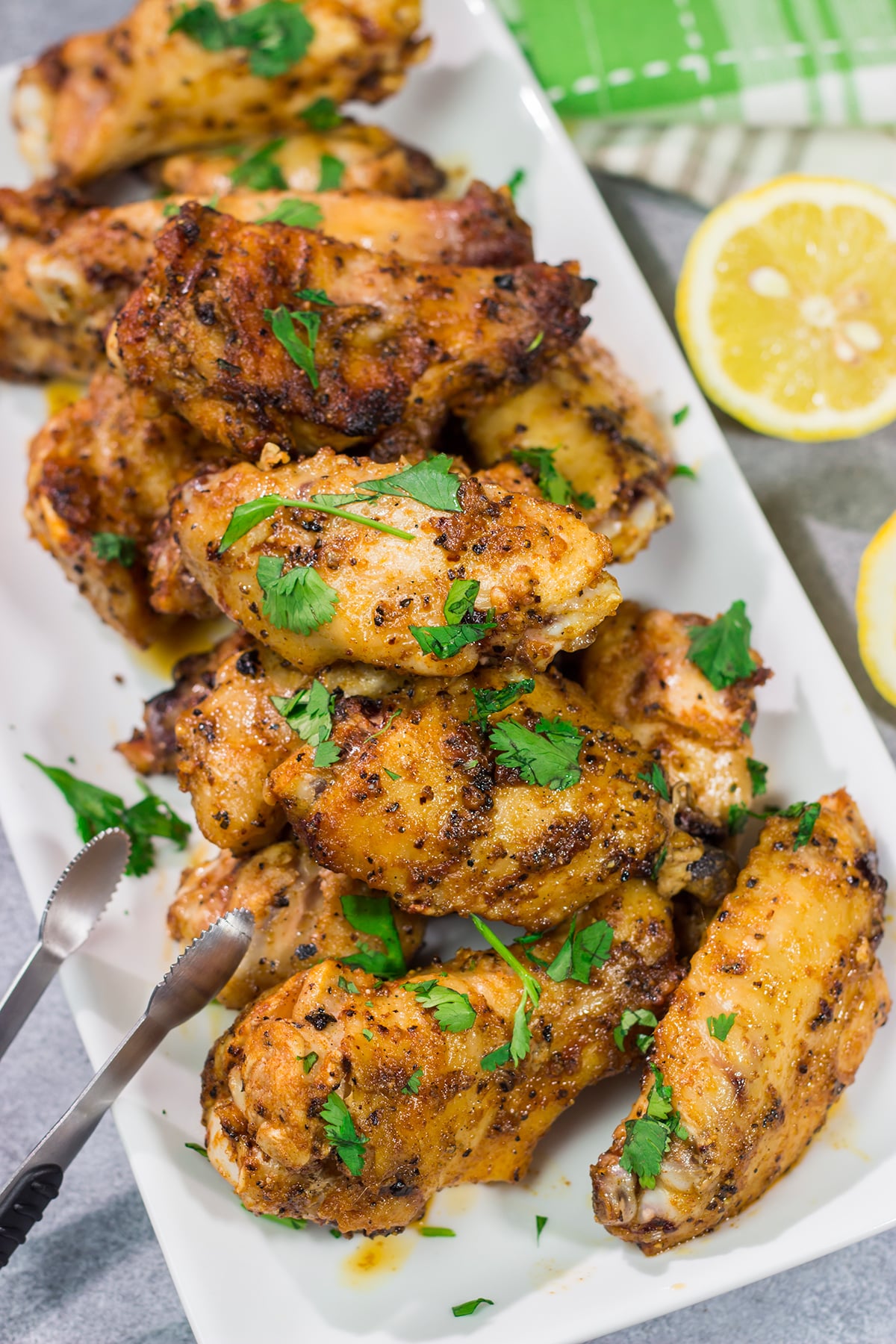 These Lemon Pepper Wings are perfect for summer barbecues in the backyard! Go ahead and make a double batch - you'll be glad you did!