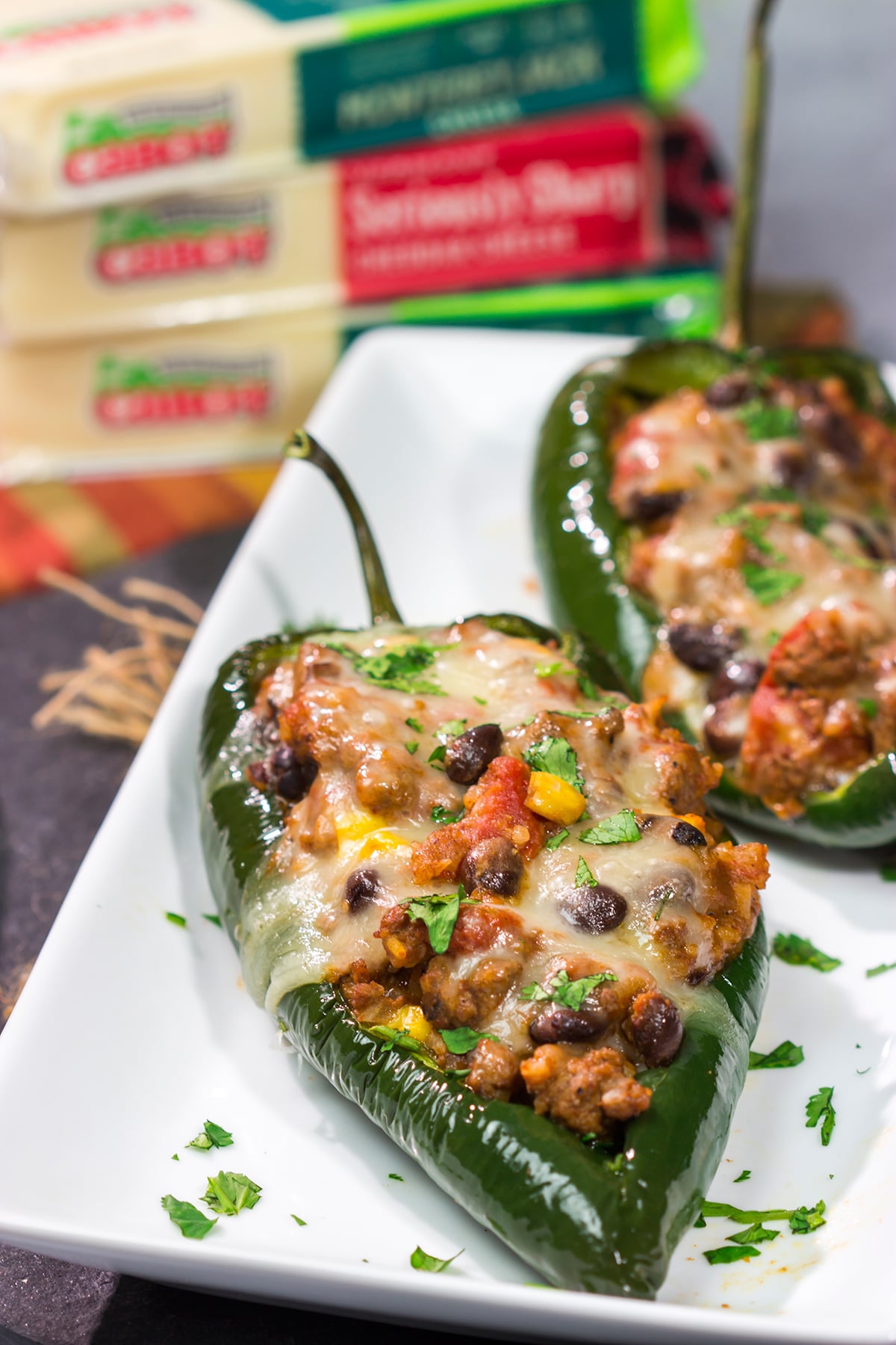 Mix up taco night with these Cheesy Stuffed Poblano Peppers! This flavor-packed recipe makes for a fun and delicious meal that is sure to become a family favorite.