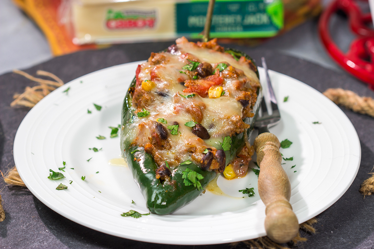 Mix up taco night with these Cheesy Stuffed Poblano Peppers! This flavor-packed recipe makes for a fun and delicious meal that is sure to become a family favorite.