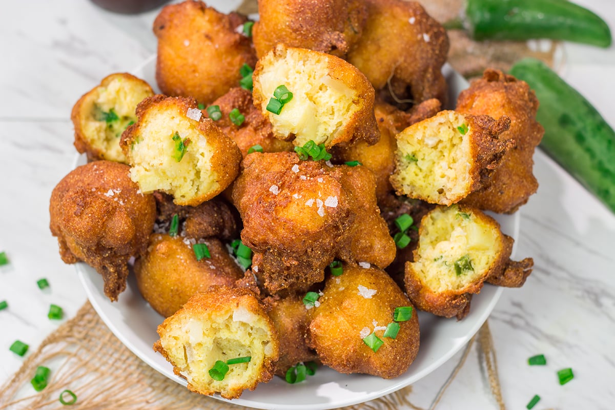 A little bit sweet. A little bit spicy. These Jalapeno Pineapple Hushpuppies are a fun twist on the classic seafood side dish!