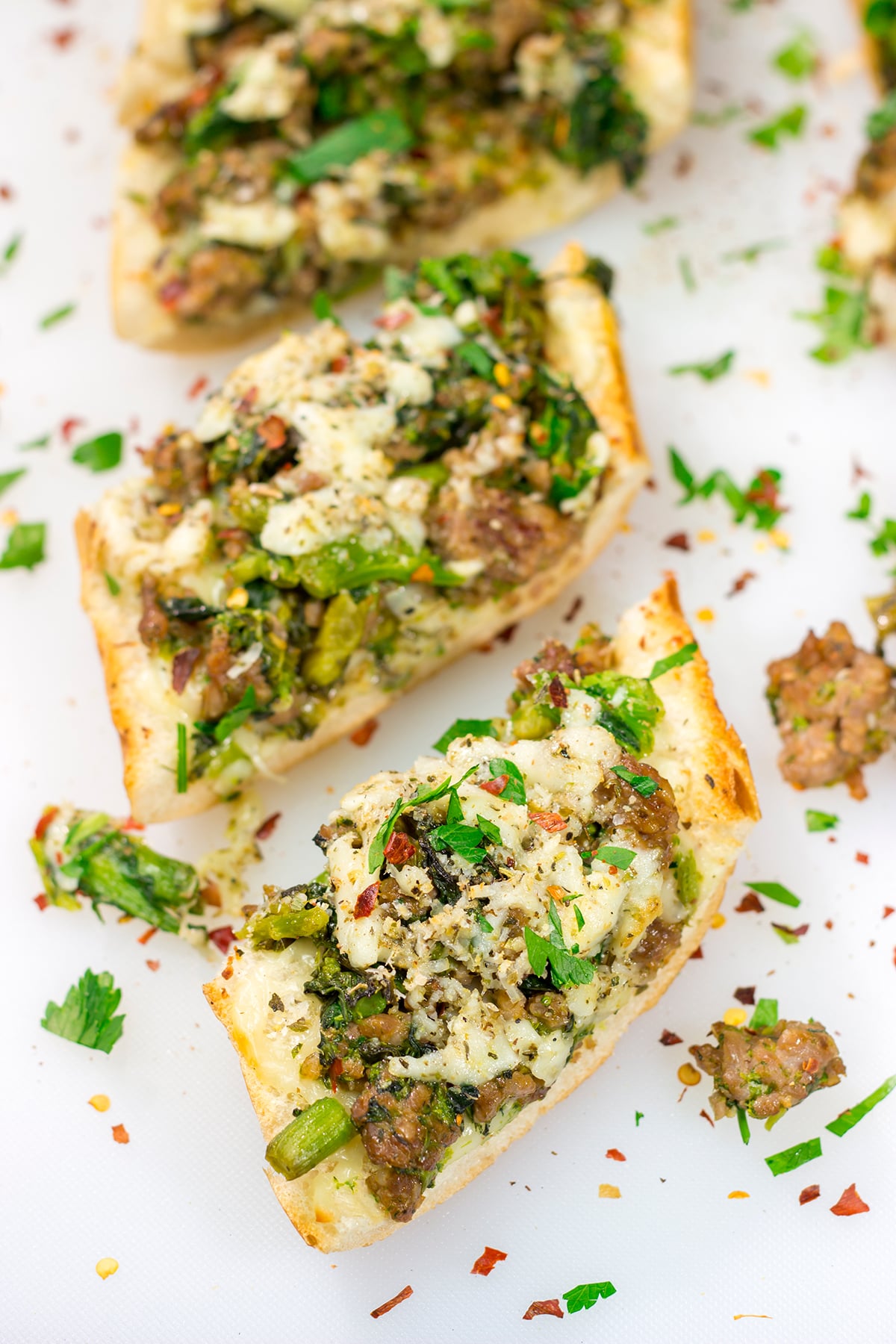This Sausage and Broccoli Rabe Cheesy Bread a fun and delicious twist on the classic Italian pasta dish. Put it on the menu soon!