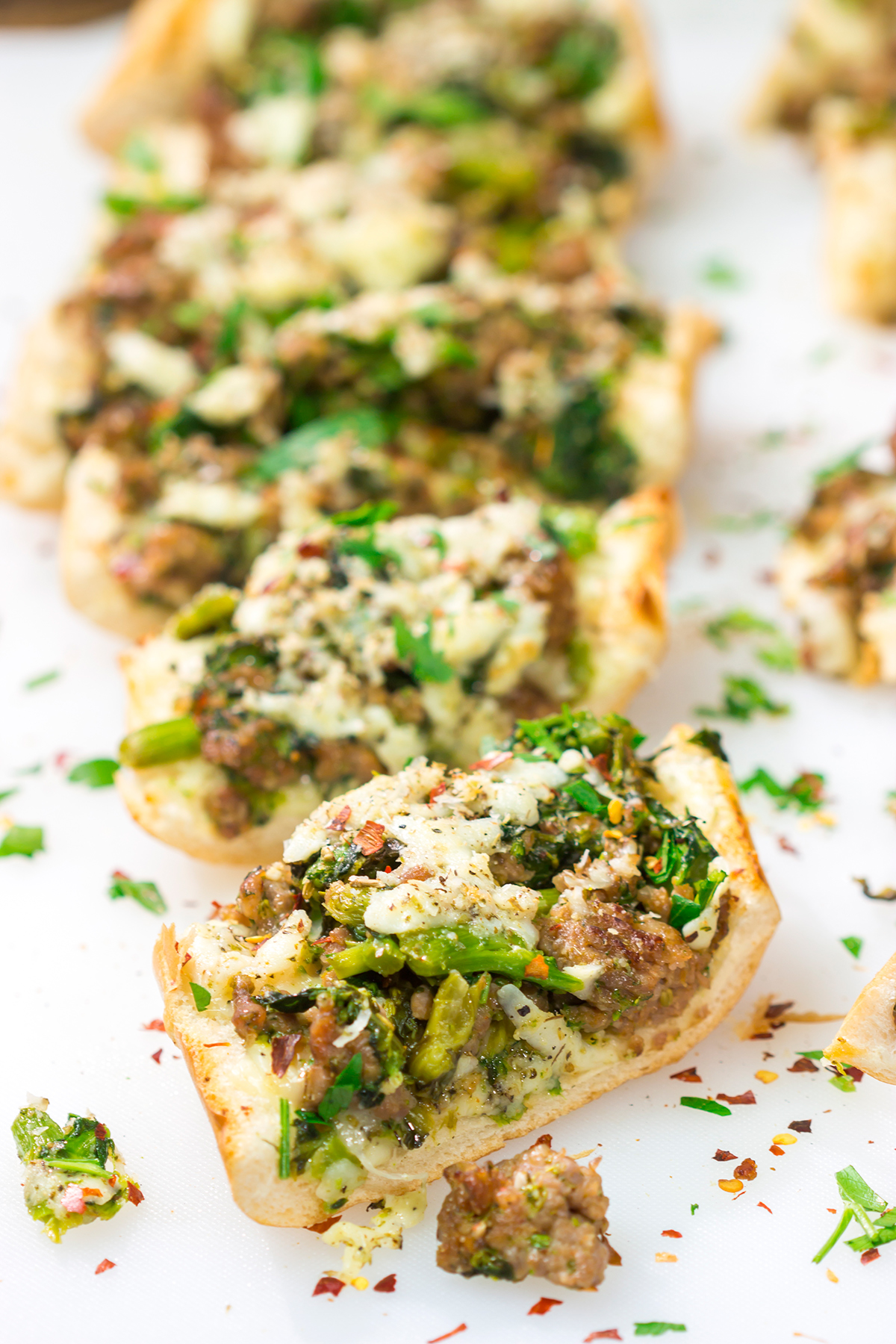 This Sausage and Broccoli Rabe Cheesy Bread a fun and delicious twist on the classic Italian pasta dish. Put it on the menu soon!