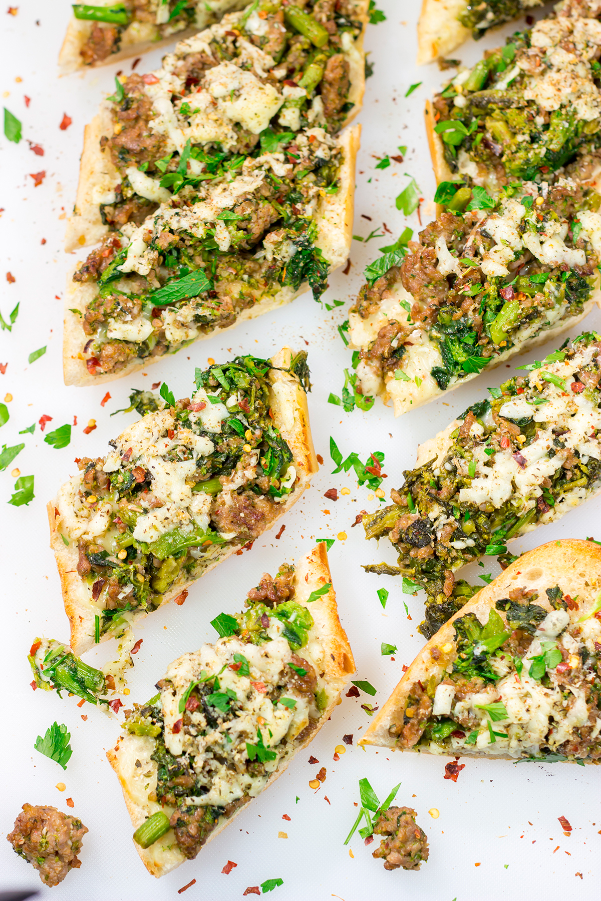 This Sausage and Broccoli Rabe Cheesy Bread a fun and delicious twist on the classic Italian pasta dish. Put it on the menu soon!