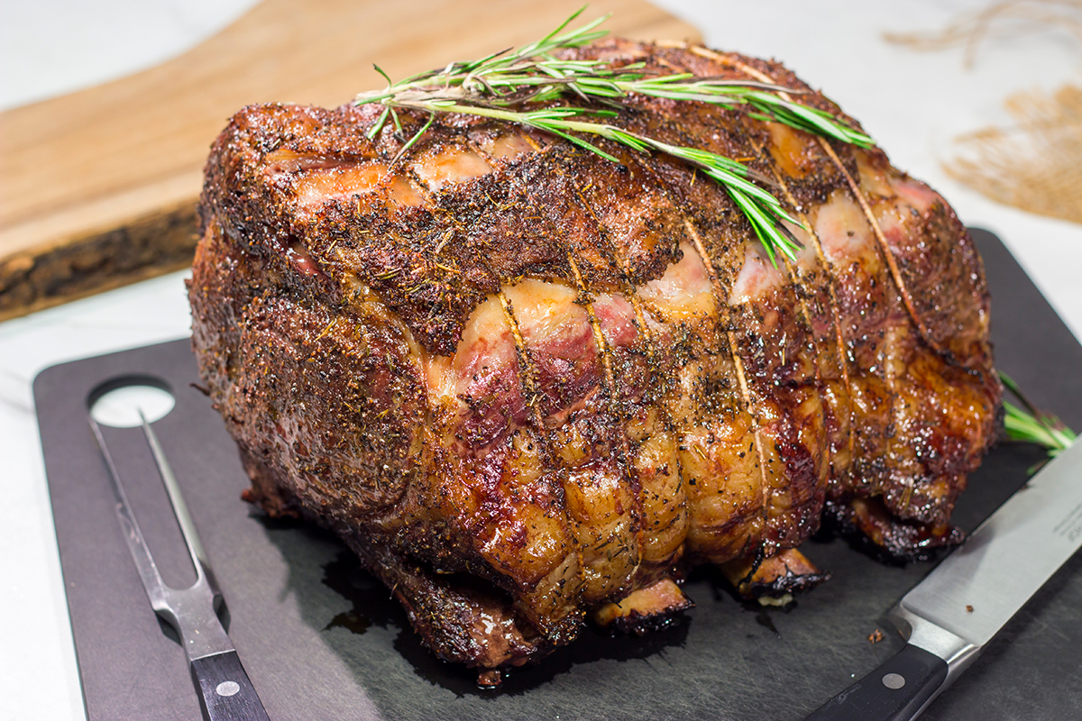 Smoked Prime Rib is a company worthy meal! This prime rib roast (aka standing rib roast) is slow-smoked for flavor and then seared to create a delicious exterior crust.
