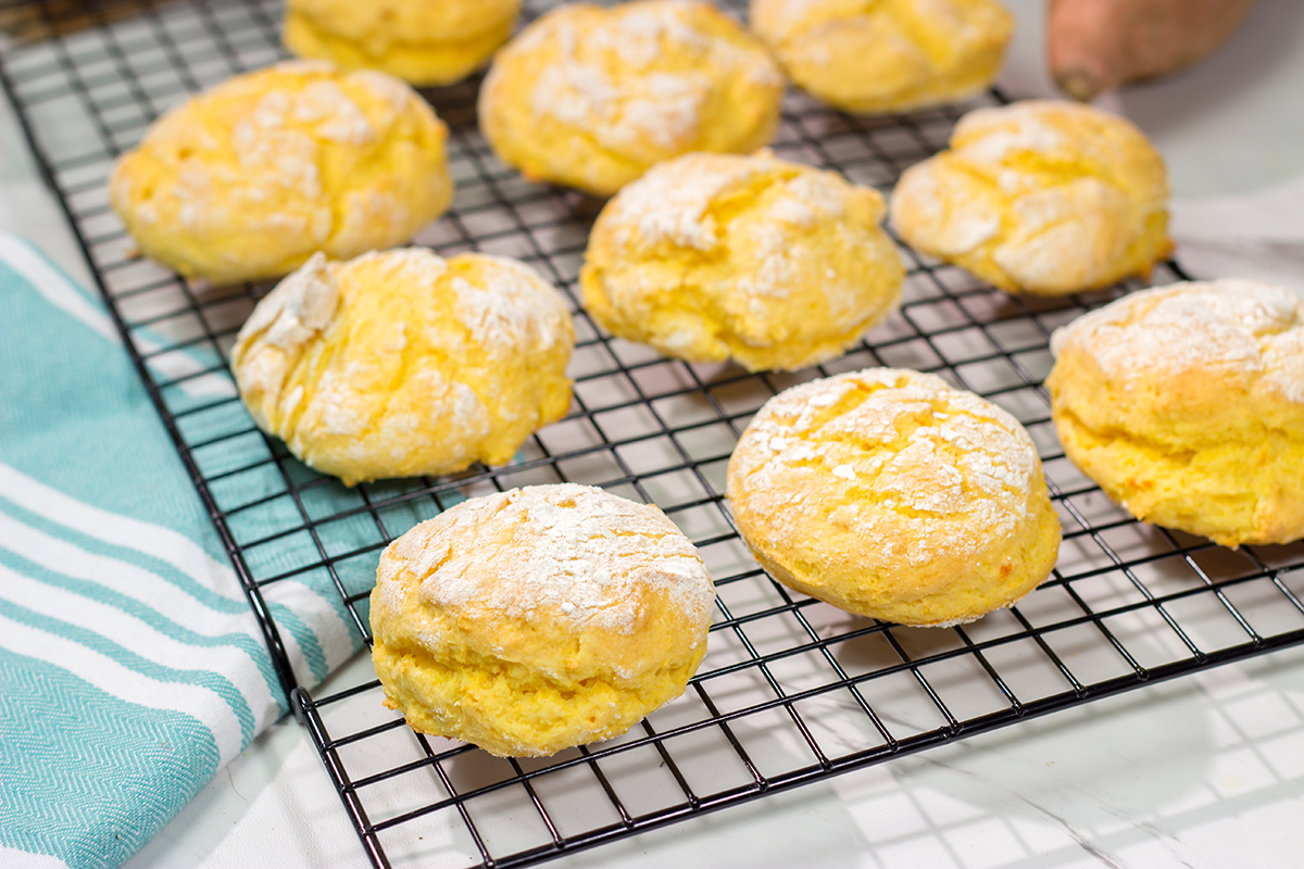 Sweet potatoes...in a biscuit!? Give it a try! These Sweet Potato Biscuits are light and fluffy, and they make a great side dish to any meal.