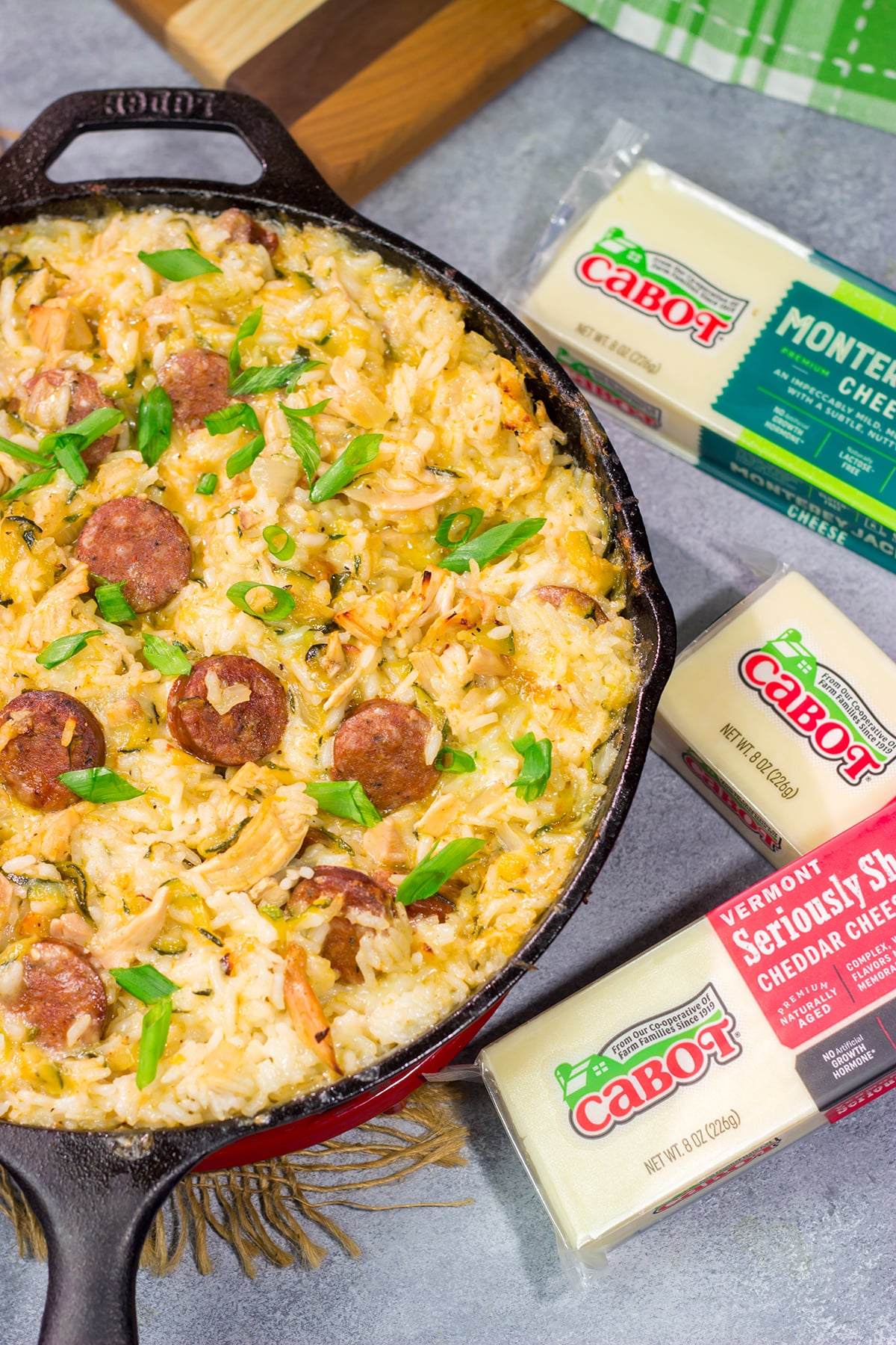 Looking for a tasty one one pot meal? Put this Zucchini and Cheesy Rice Skillet on the menu!
