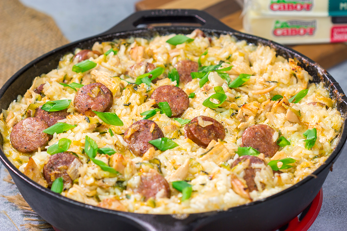 Looking for a tasty one one pot meal? Put this Zucchini and Cheesy Rice Skillet on the menu!