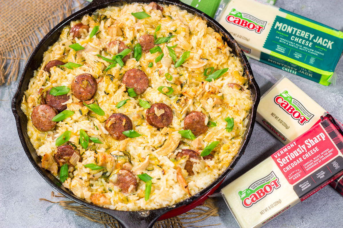 Looking for a tasty one one pot meal? Put this Zucchini and Cheesy Rice Skillet on the menu!