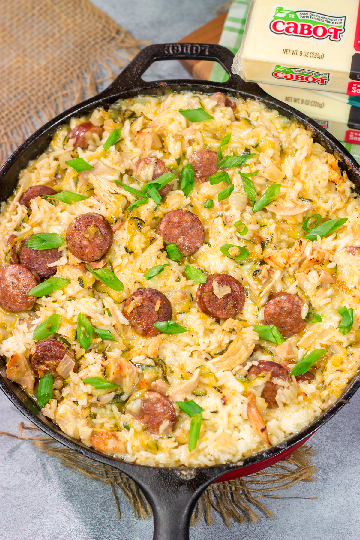 Looking for a tasty one one pot meal? Put this Zucchini and Cheesy Rice Skillet on the menu!