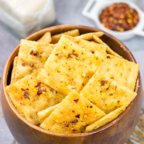 These Spicy Cajun Firecrackers are crispy saltine crackers that pack a serious flavor punch. They're an easy appetizer for parties or gamedays!