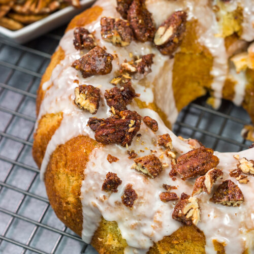 This Sweet Potato Pound Cake is a tender, buttery cake recipe that calls for cinnamon and mashed sweet potatoes. Topped with cinnamon pecans, this cake is the perfect fall dessert!