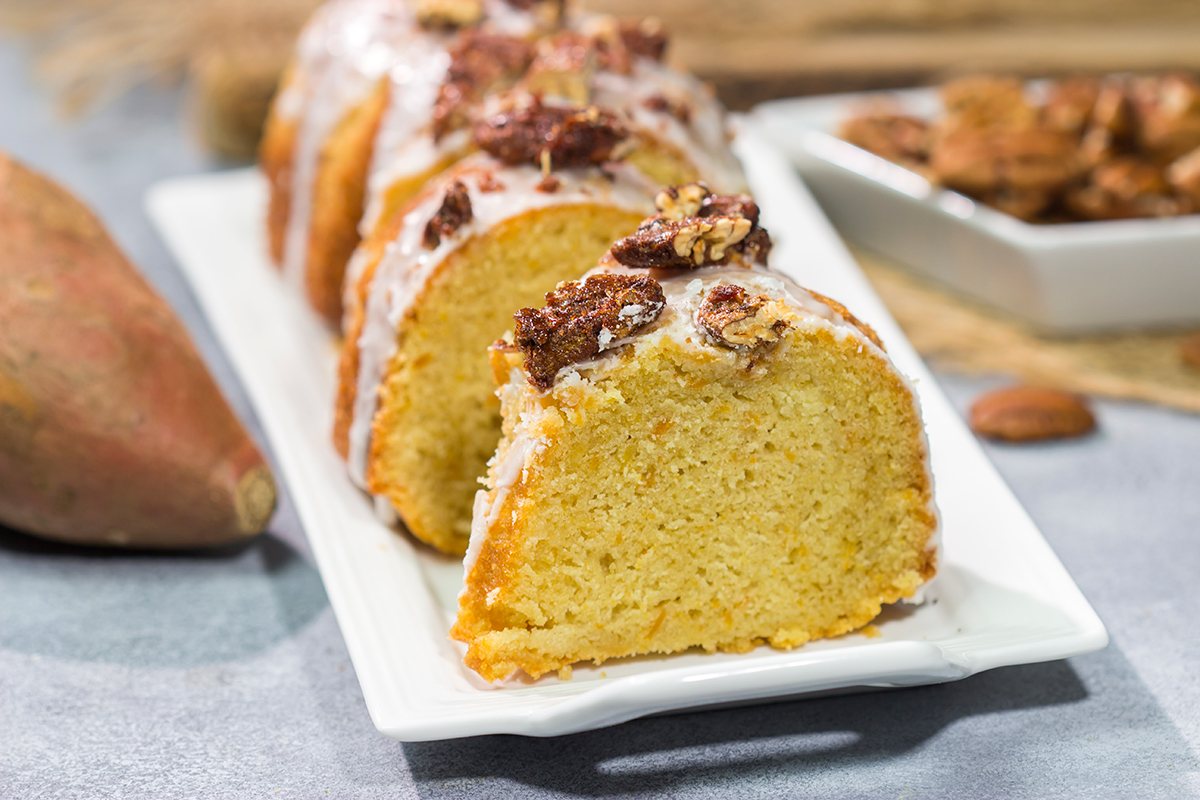 This Sweet Potato Pound Cake is a tender, buttery cake recipe that calls for cinnamon and mashed sweet potatoes. Topped with cinnamon pecans, this cake is the perfect fall dessert!