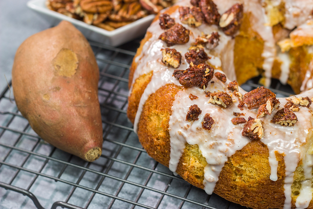 This Sweet Potato Pound Cake is a tender, buttery cake recipe that calls for cinnamon and mashed sweet potatoes. Topped with cinnamon pecans, this cake is the perfect fall dessert!