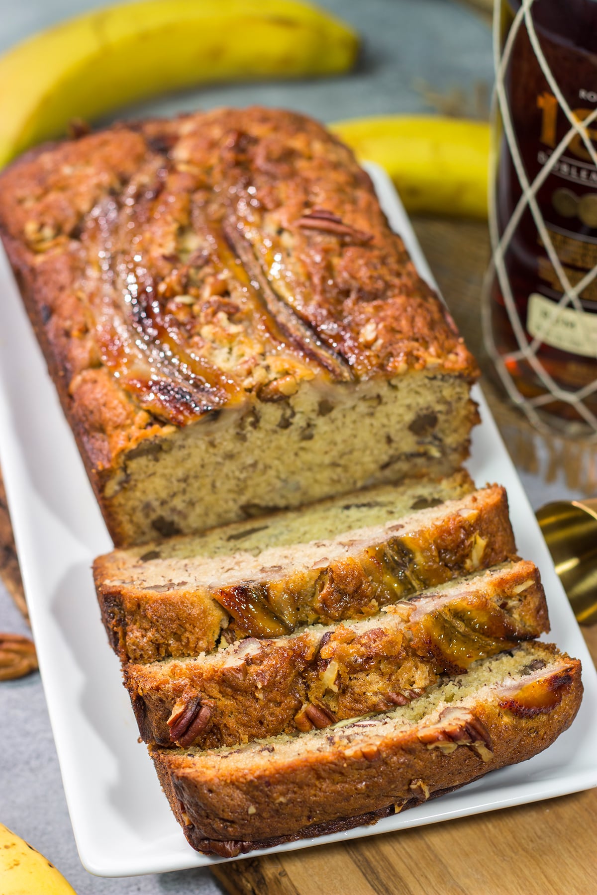 This Bananas Foster Banana Bread is a cross between Bananas Foster and banana bread. It's a fun, boozy twist to a classic quick bread!