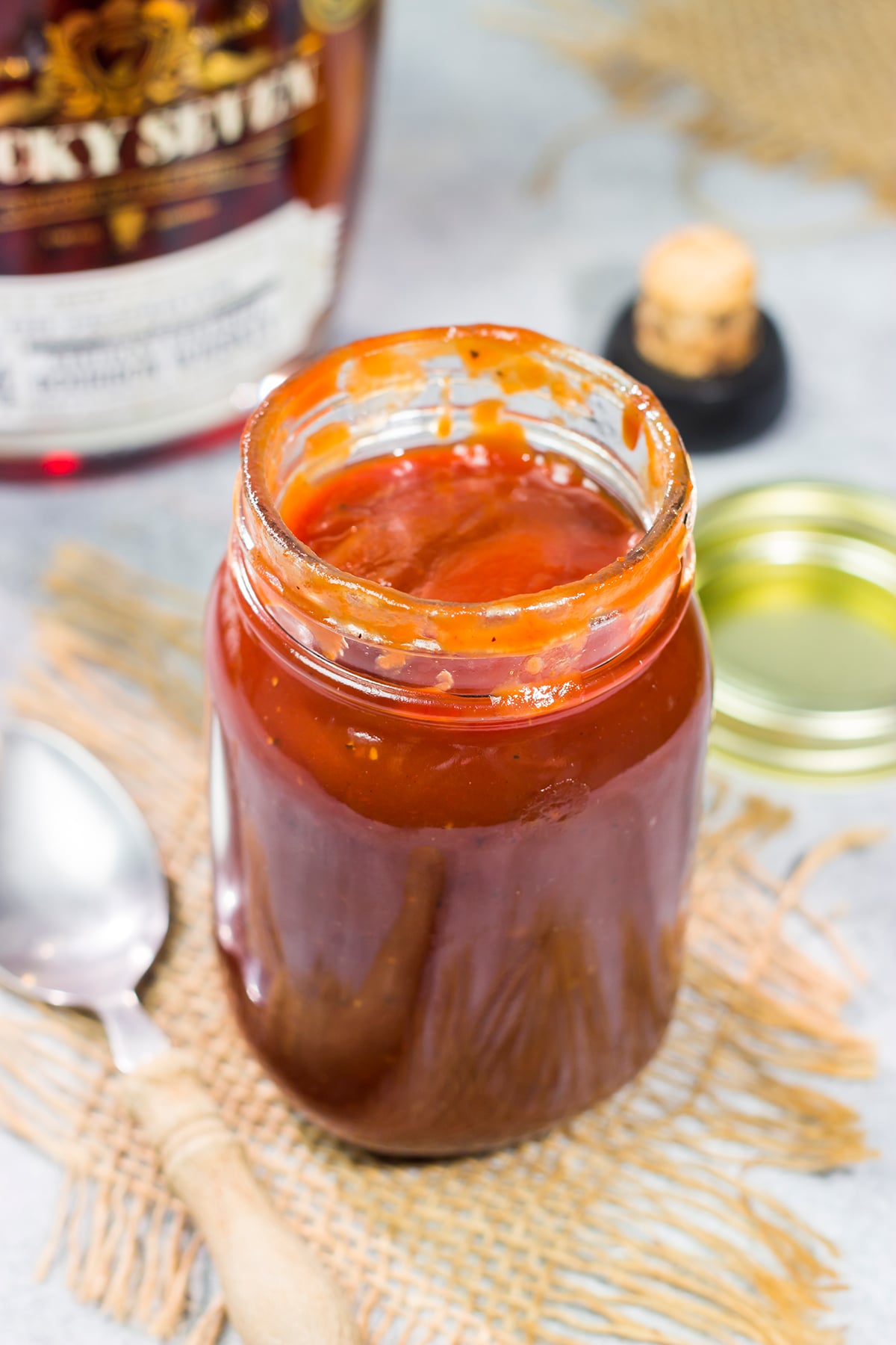 This smoky Bourbon BBQ Sauce is a tasty combination of sweet and spicy. Refrigerate it for a day or two before brushing on ribs, brisket or grilled chicken!