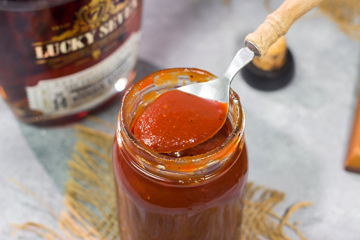 This smoky Bourbon BBQ Sauce is a tasty combination of sweet and spicy. Refrigerate it for a day or two before brushing on ribs, brisket or grilled chicken!