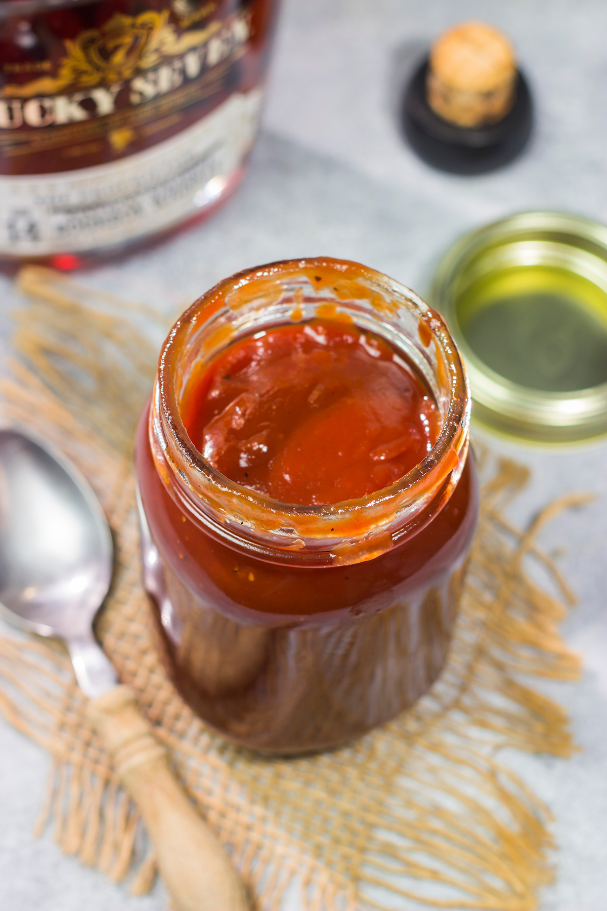 This smoky Bourbon BBQ Sauce is a tasty combination of sweet and spicy. Refrigerate it for a day or two before brushing on ribs, brisket or grilled chicken!