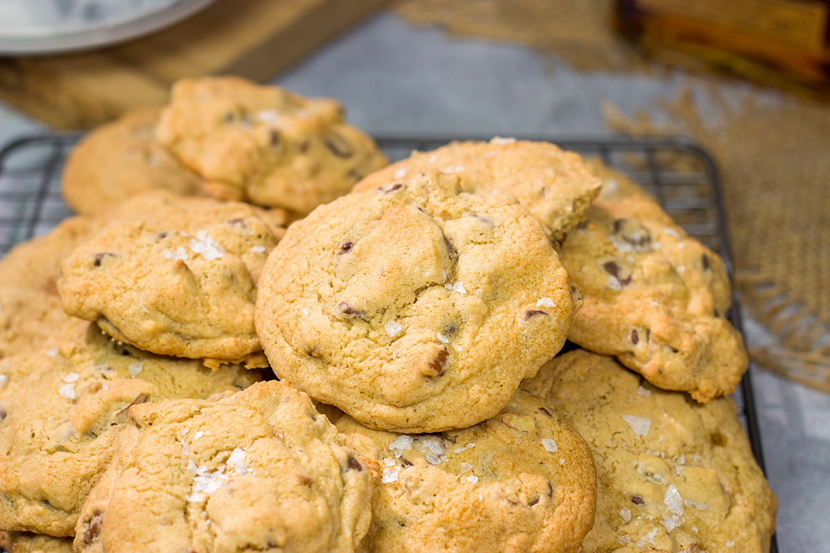 These Bourbon Chocolate Chip Cookies are perhaps the best cookie ever! They're crispy on the edges, chewy in the middle and packed with flavor. Good luck eating just one!