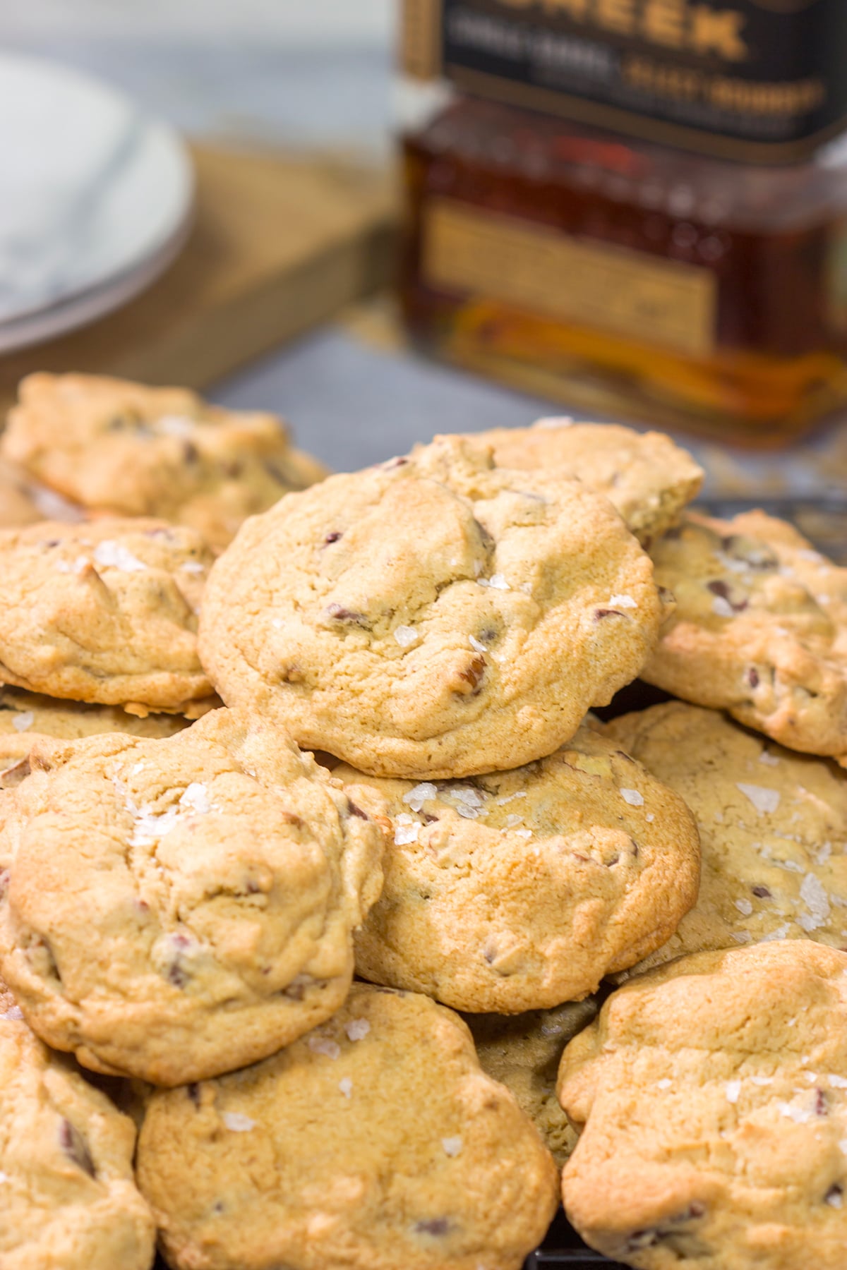 These Bourbon Chocolate Chip Cookies are perhaps the best cookie ever! They're crispy on the edges, chewy in the middle and packed with flavor. Good luck eating just one!