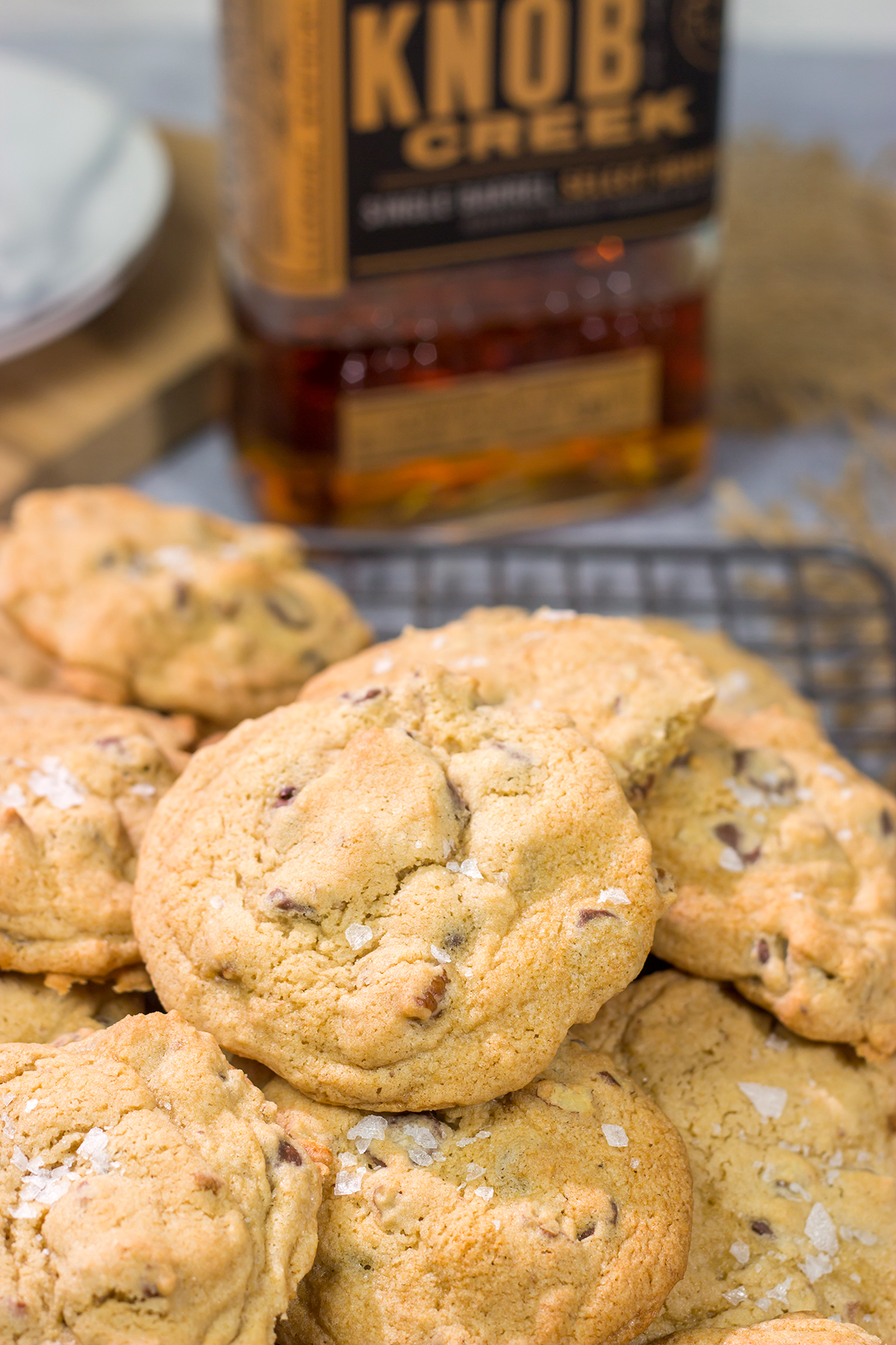 These Bourbon Chocolate Chip Cookies are perhaps the best cookie ever! They're crispy on the edges, chewy in the middle and packed with flavor. Good luck eating just one!